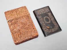 A 19th century Chinese tortoiseshell card case and a similar carved sandalwood card case, 11 cms