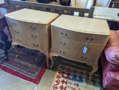 A pair of pale walnut three drawer bedside chests, width 60cm, depth 45cm, height 74cm