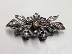A 19th century continental white and yellow metal , rose cut diamond set floral spray brooch,