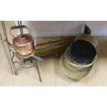 A copper kettle and trivet stand, a brass coal scuttle and a fender,Trivet 33 cms high.
