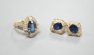A modern suite of 18k, sapphire and diamond cluster set jewellery, comprising a dress ring, size L/M