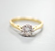 A modern 18ct gold and solitaire diamond ring, size O, gross weight 3 grams,the stone weighing