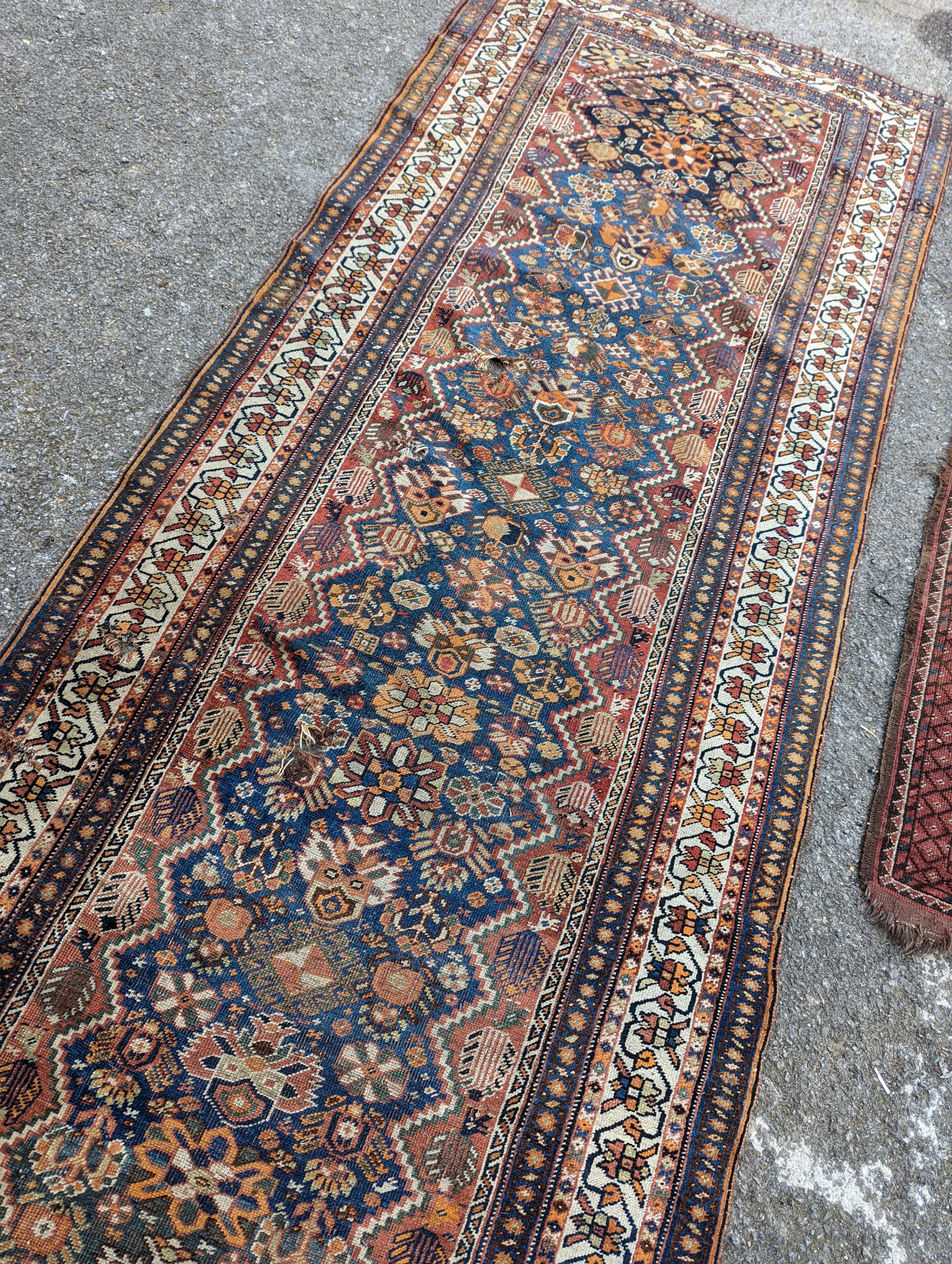 A North West Persian blue ground runner, 300 x 109 (worn and holed) a North West Persian rug, Bohara - Image 11 of 12