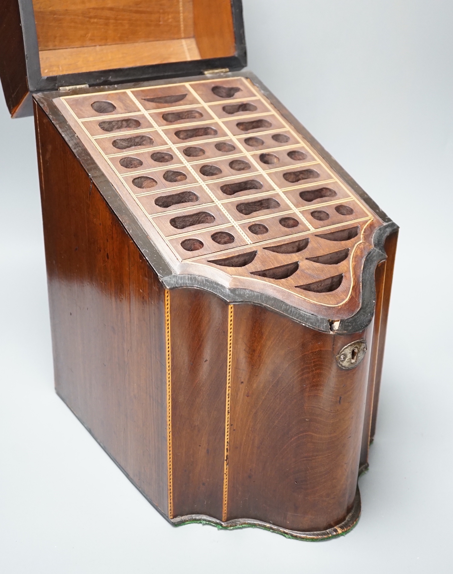 A George III mahogany knife box, with segmented interior, 30cm