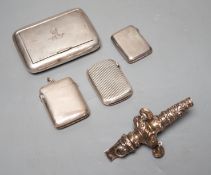 An Edwardian silver snuff box, with engraved crest, Birmingham, 1907, 82mm, three silver vesta cases