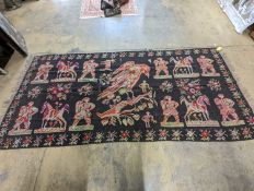 An antique Ukranian flatweave carpet woven with figures and birds, approx. 350 x 170cm