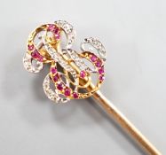 An early 20tyh century French yellow metal (18ct poincon mark) ruby and diamond set 'ER' monogram