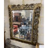 A Victorian carved giltwood wall mirror, width 94cm, height 114cm