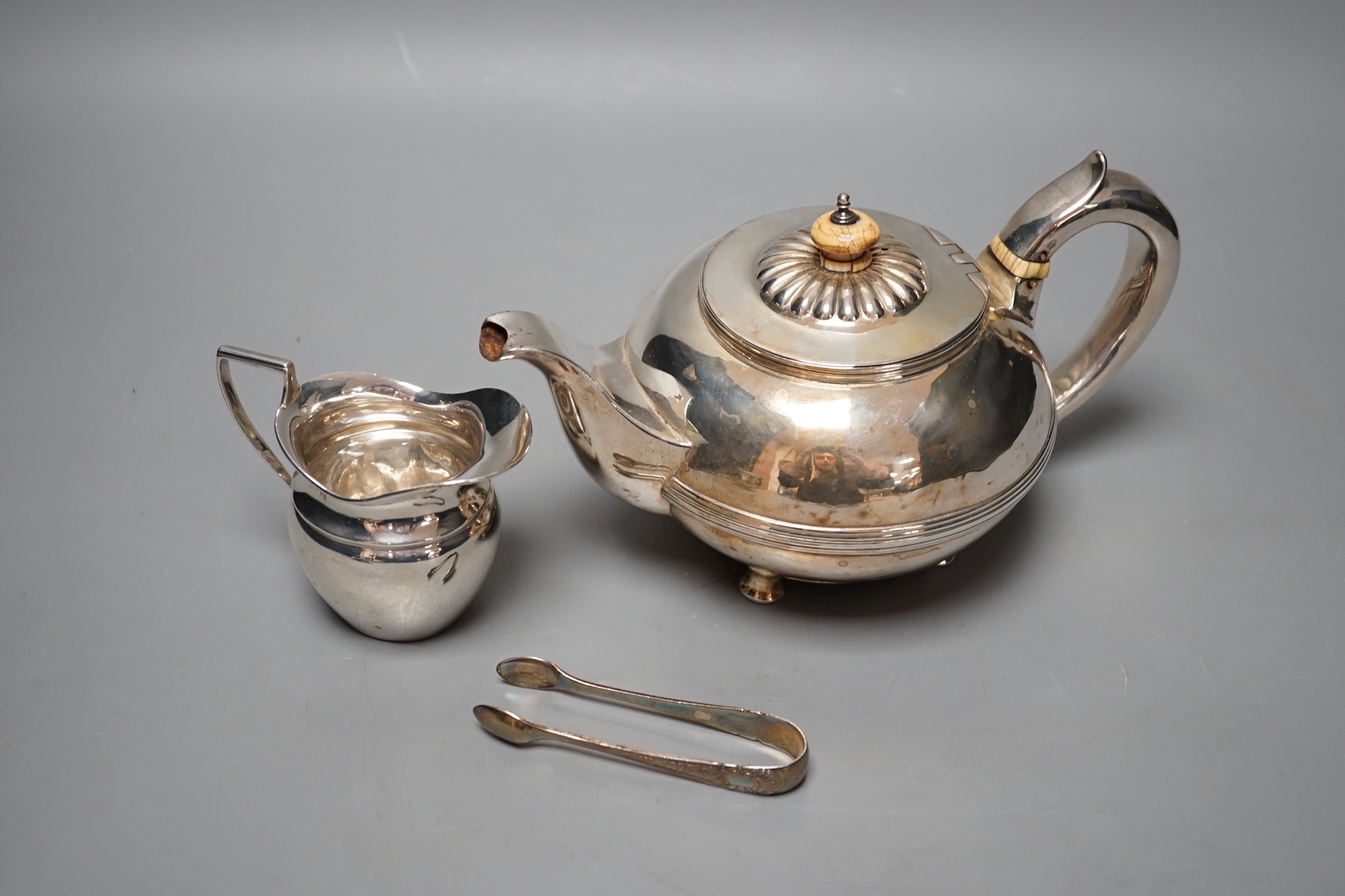 A George IV silver circular teapot, Craddock & Reid, London, 1824, a later silver cream jug and pair - Image 2 of 4