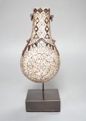 A powder flask, Etawah, India, 19th century, Mother-of-pearl, ivory, horn and black lac on wood -