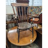 A Victorian elm and beech Windsor lathe back elbow chair, width 58cm, depth 47cm, height 109cm