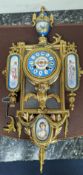 An early 20th century gilt metal and Sevres style porcelain mounted wall clock 58cm