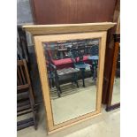 A pair of contemporary tulip banded rectangular wall mirrors, width 81cm, height 115cm