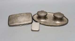 A George V silver double oval inkwell, with engraved inscription, Birmingham, 1913, 20.3cm, a silver