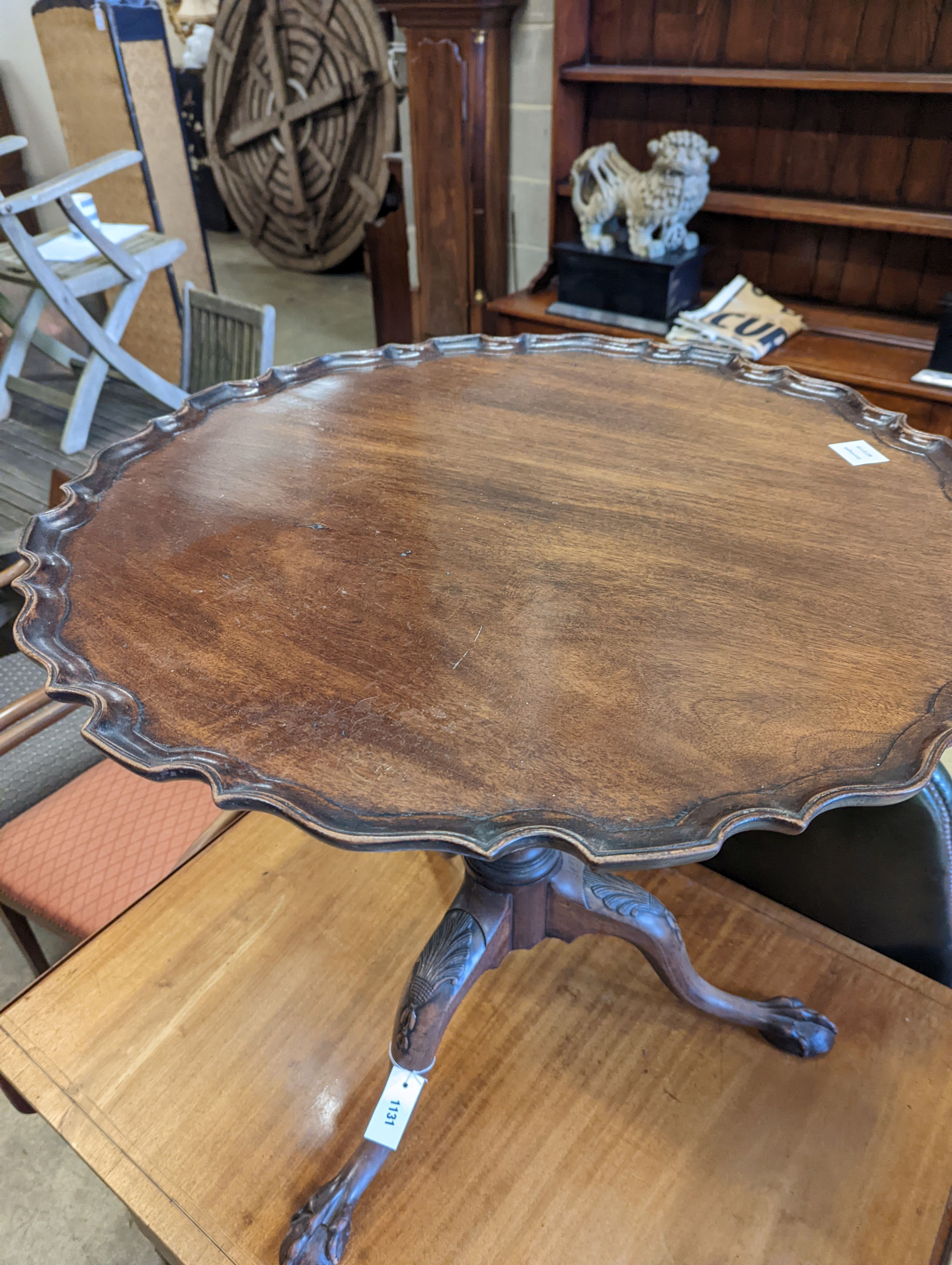 A George III style circular mahogany tripod table, with piecrust top and claw and ball feet, - Image 2 of 6