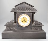 A large Victorian black slate mantel clock, with pendulum - 39cm high