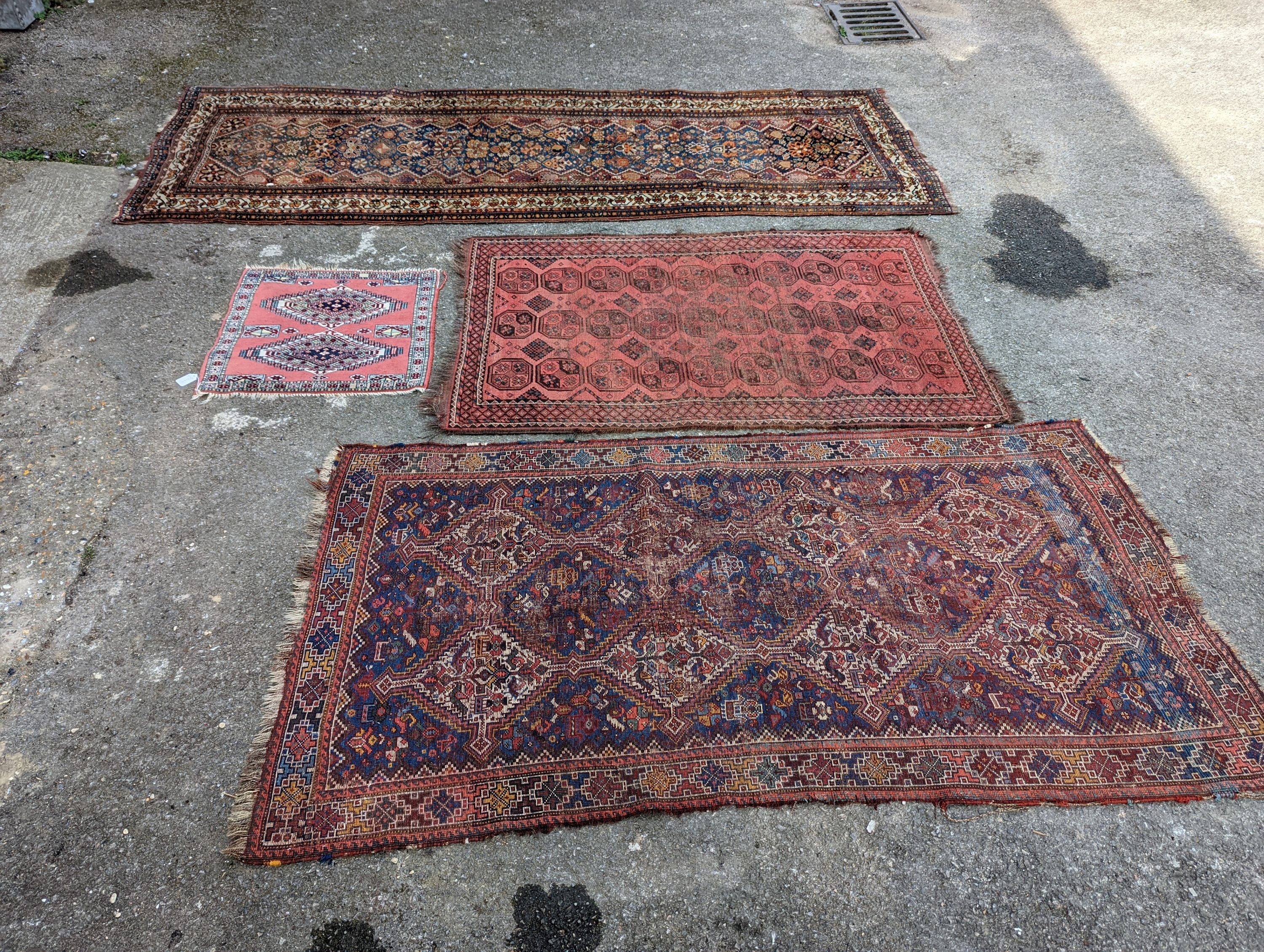 A North West Persian blue ground runner, 300 x 109 (worn and holed) a North West Persian rug, Bohara