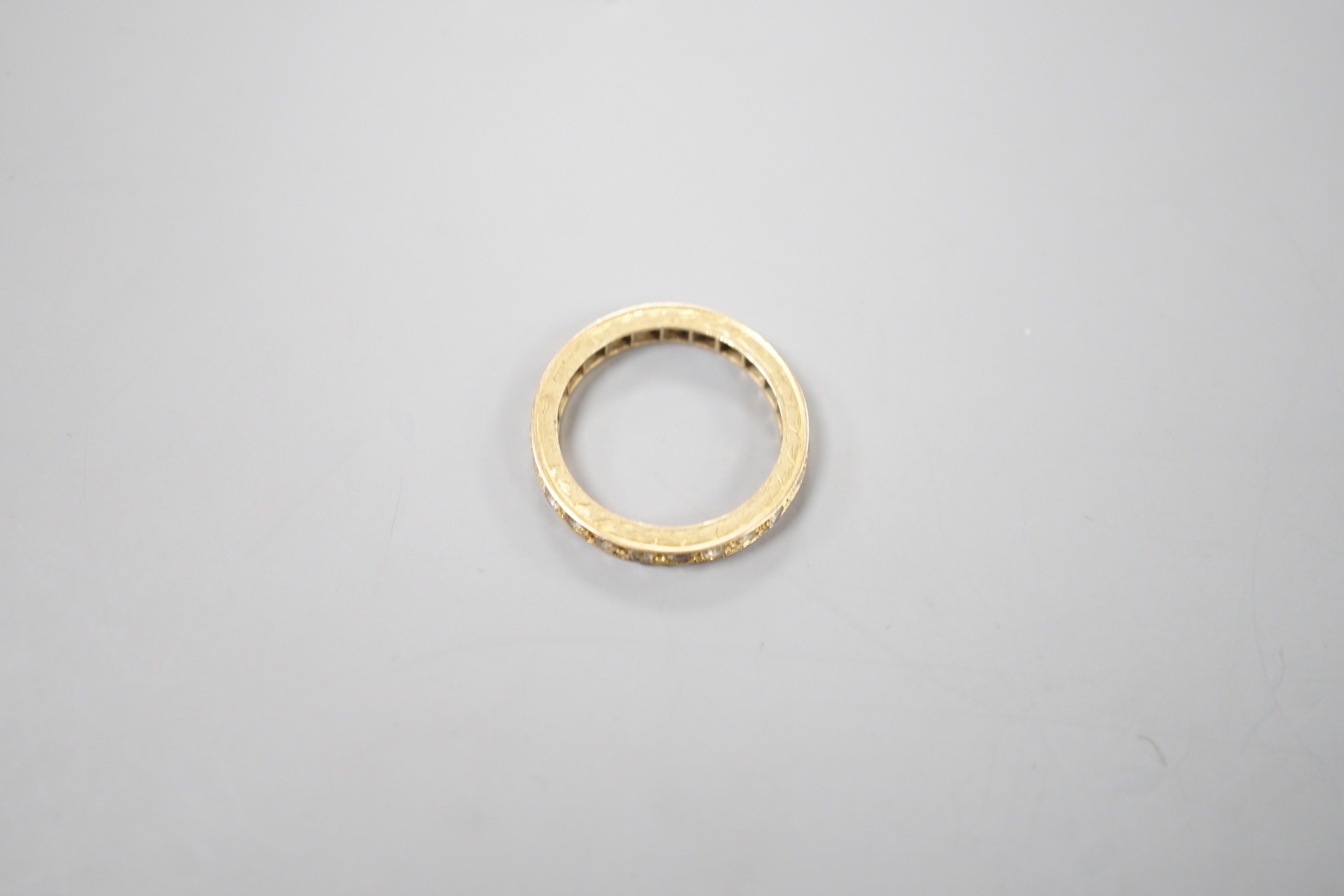 An 18ct and diamond chip set full eternity ring, size L, gross weight 3.4 grams. - Image 3 of 3