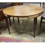 A mid century design Frem Rojle Roundette extending circular teak dining table, diameter 120cm,