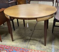 A mid century design Frem Rojle Roundette extending circular teak dining table, diameter 120cm,