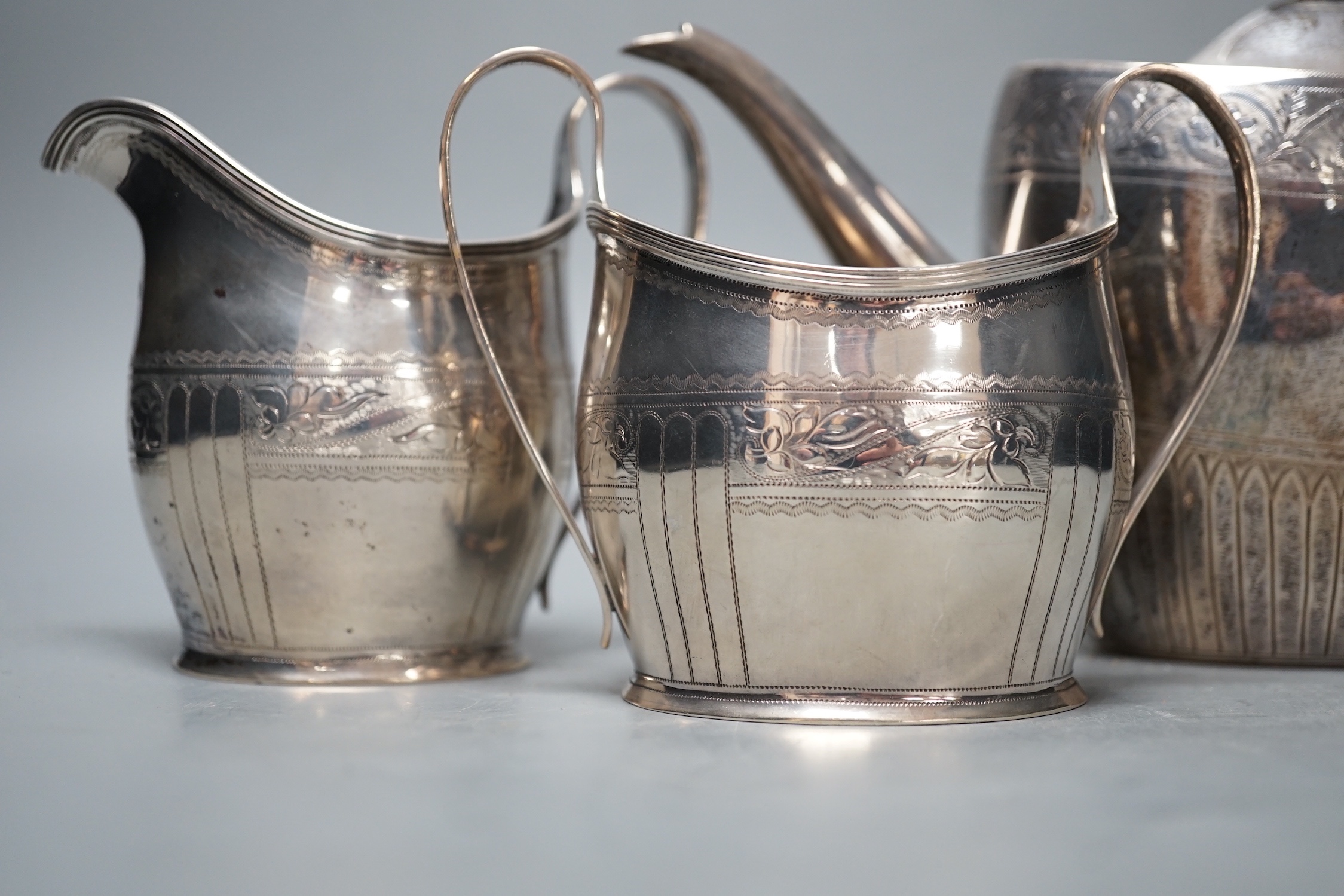 A 1930's engraved silver oval three piece tea set, S. Blanckensee & Sons Ltd, Chester, 1936/7, gross - Image 3 of 4