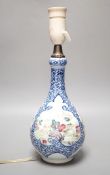 An 18th century Chinese famille rose vase mounted as a table lamp