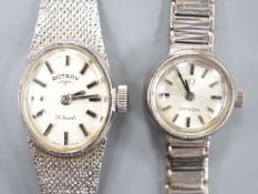 A lady's 9ct white gold Rotary manual wind wrist watch and a similar Omega wrist watch, gross 31.5