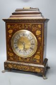 A Victorian floral painted mahogany bracket timepiece, with fusee movement, with key and pendulum,