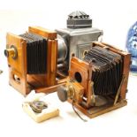 An early 20th magic lantern and a bellows camera,Magic lantern 51 cms wide.