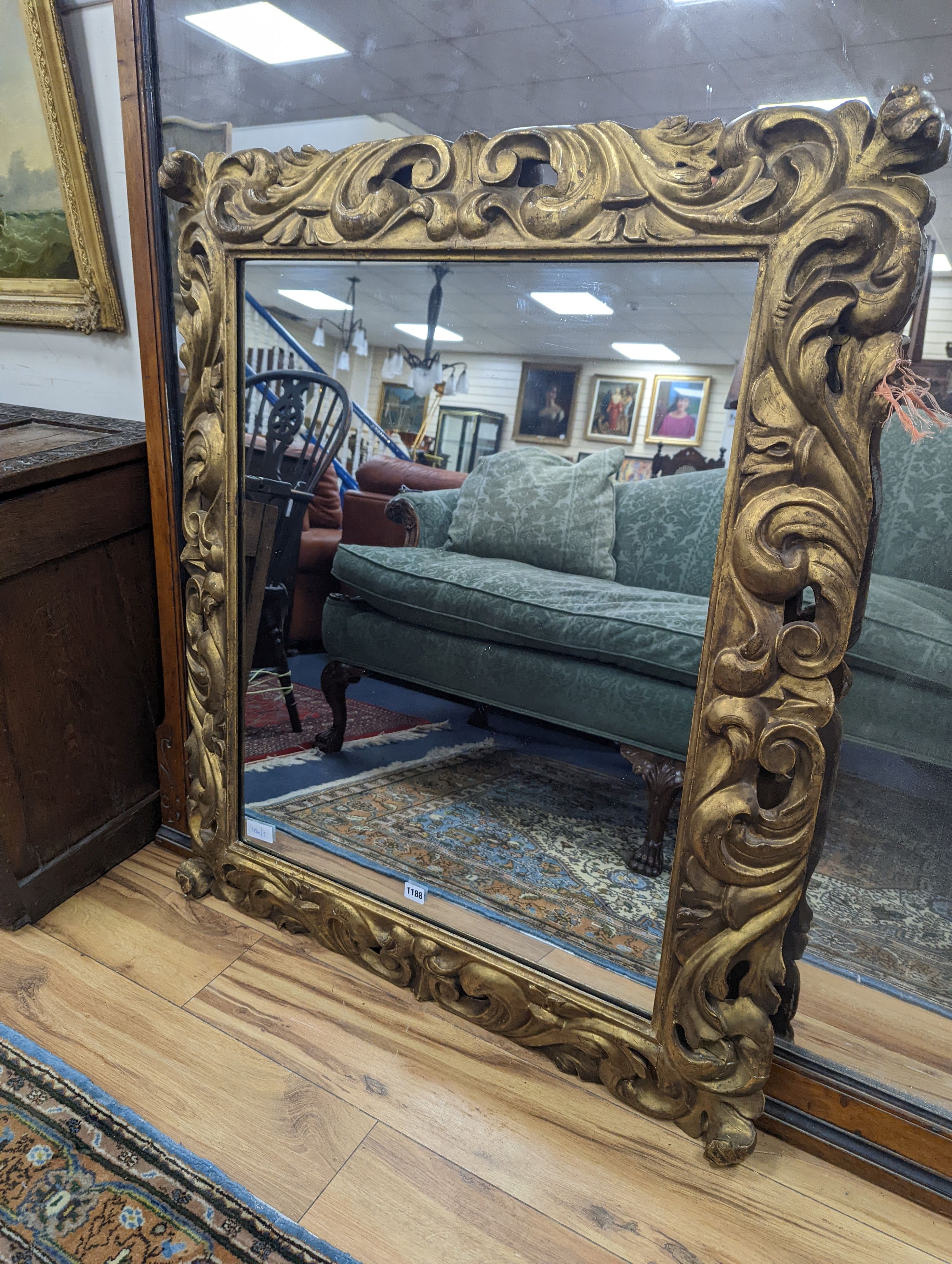 A 19th century French carved giltwood wall mirror with acanthus scroll frame, width 91cm, height