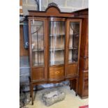 An Edwardian inlaid mahogany bow fronted display cabinet, width 114cm, depth 42cm, height 209cm