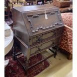 An early 20th century oak bureau, width 76cm, depth 44cm, height 100cm