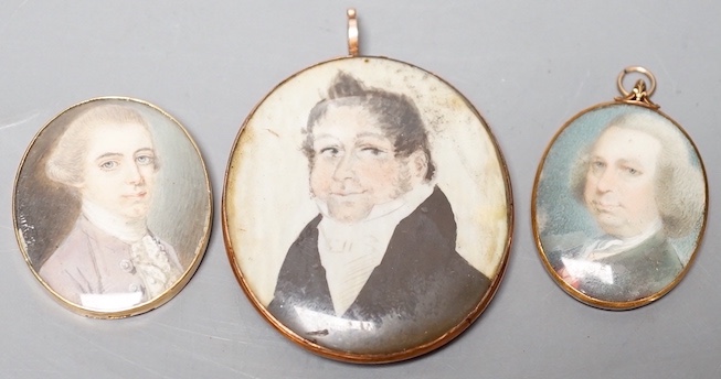 Three Georgian portrait miniatures on ivory of gentlemen,largest 5 cms high, two gold framed