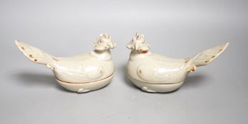 A pair of Chinese celadon glazed 'bird' vessels and covers 16cm