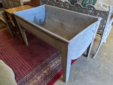 A large galvanised trough, width 126cm, depth 74cm, height 76cm