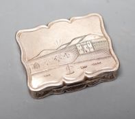 A Victorian silver shaped rectangular vinaigrette, engraved with landscape scene with river,