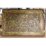 A Persian embossed and painted rectangular plaque,42.5 cms wide x 62 cms high.