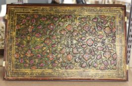 A Persian embossed and painted rectangular plaque,42.5 cms wide x 62 cms high.