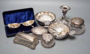 A Victorian repousse silver two handed bowl, one other silver bowl, a silver sifter spoon, four