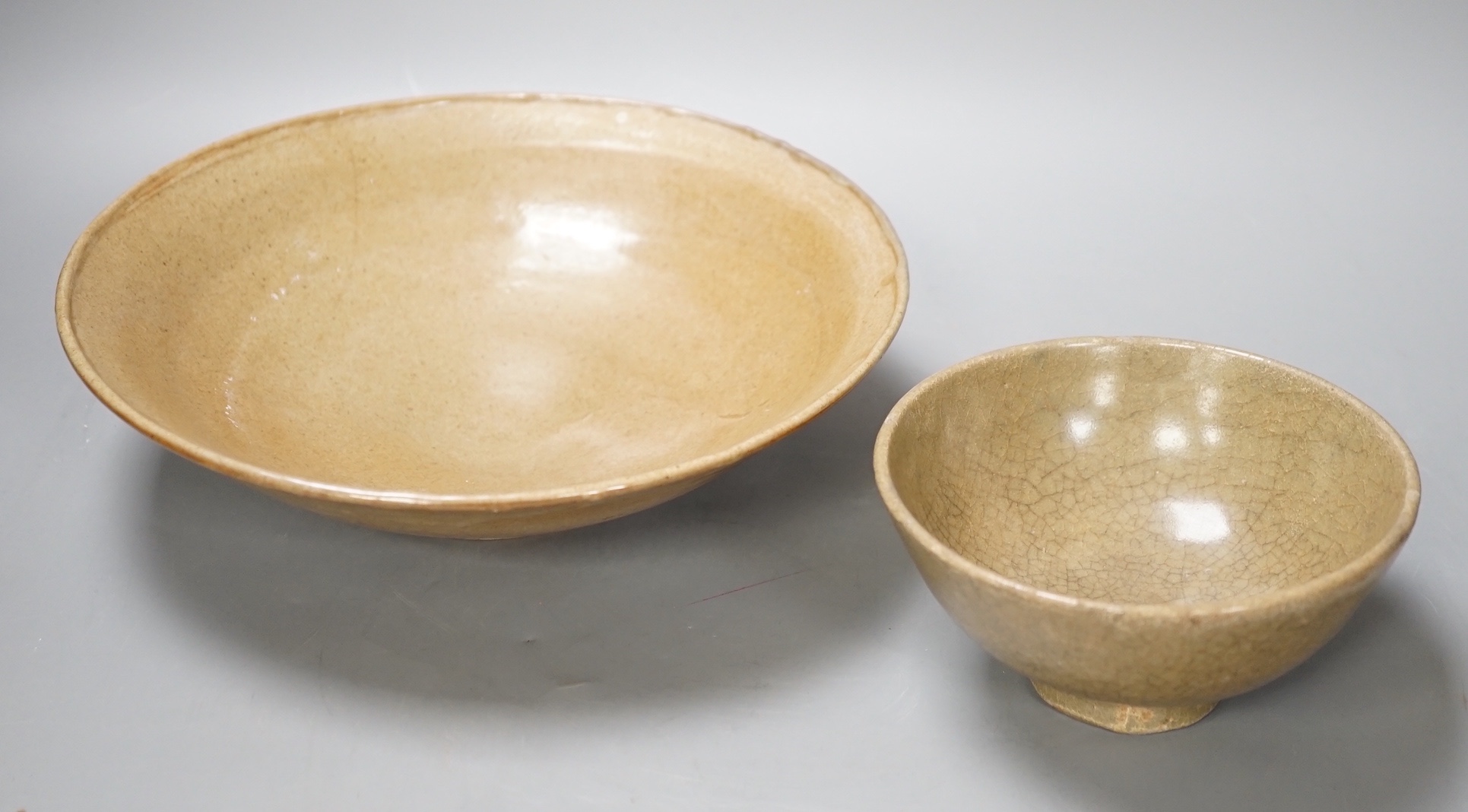Two Chinese celadon bowls, Yuan - Min dynasty, largest 25cm
