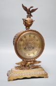 An early 20th century Empire style brass clock 32cm