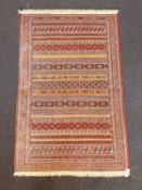 A fine Sumac flatweave polychrome rug 160 x 100 cms