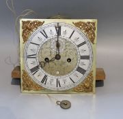 An 18th century brass eight day longcase clock movement, with silvered chapter ring, subsidiary