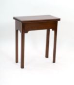 A reproduction George III style rectangular mahogany folding tea table, width 63cm depth 32cm height