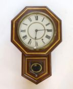 A late 19th century American mahogany drop dial wall clock, height 54 cms.