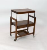 A mid century walnut metamorphic two tier tea trolley, width 69cm