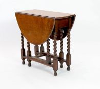A small early 20th century oak gateleg table, on spiral turned legs, width 77cm depth 37cm height