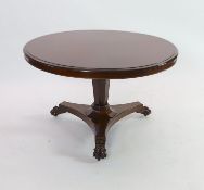 A William IV circular mahogany tilt top breakfast table, on octagonal tapered pillar, diameter 116cm