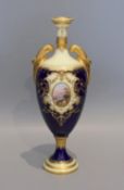 An early 20th century Coalport porcelain vase painted with a view of lake Windermere on a cobalt