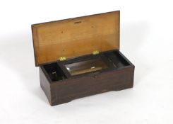 A late 19th century Swiss music box, with 18cm cylinder, in inlaid walnut and simulated walnut case,